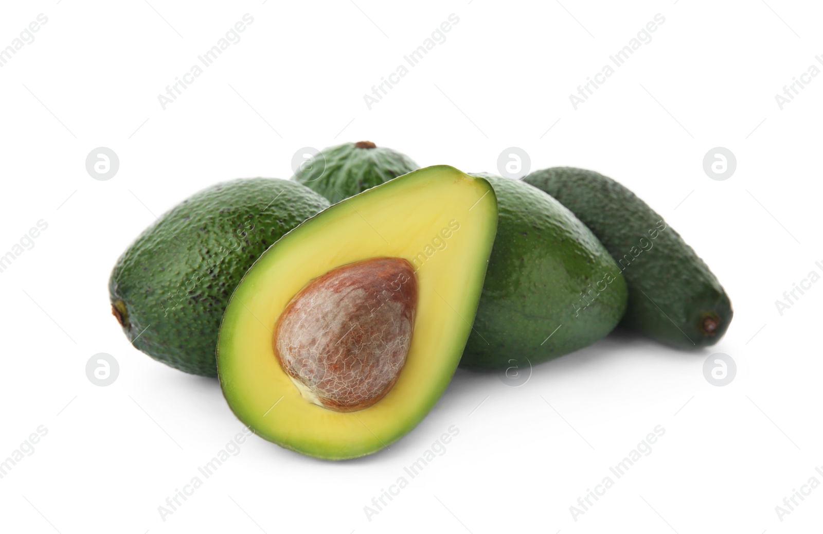 Photo of Ripe avocados on white background. Tropical fruit