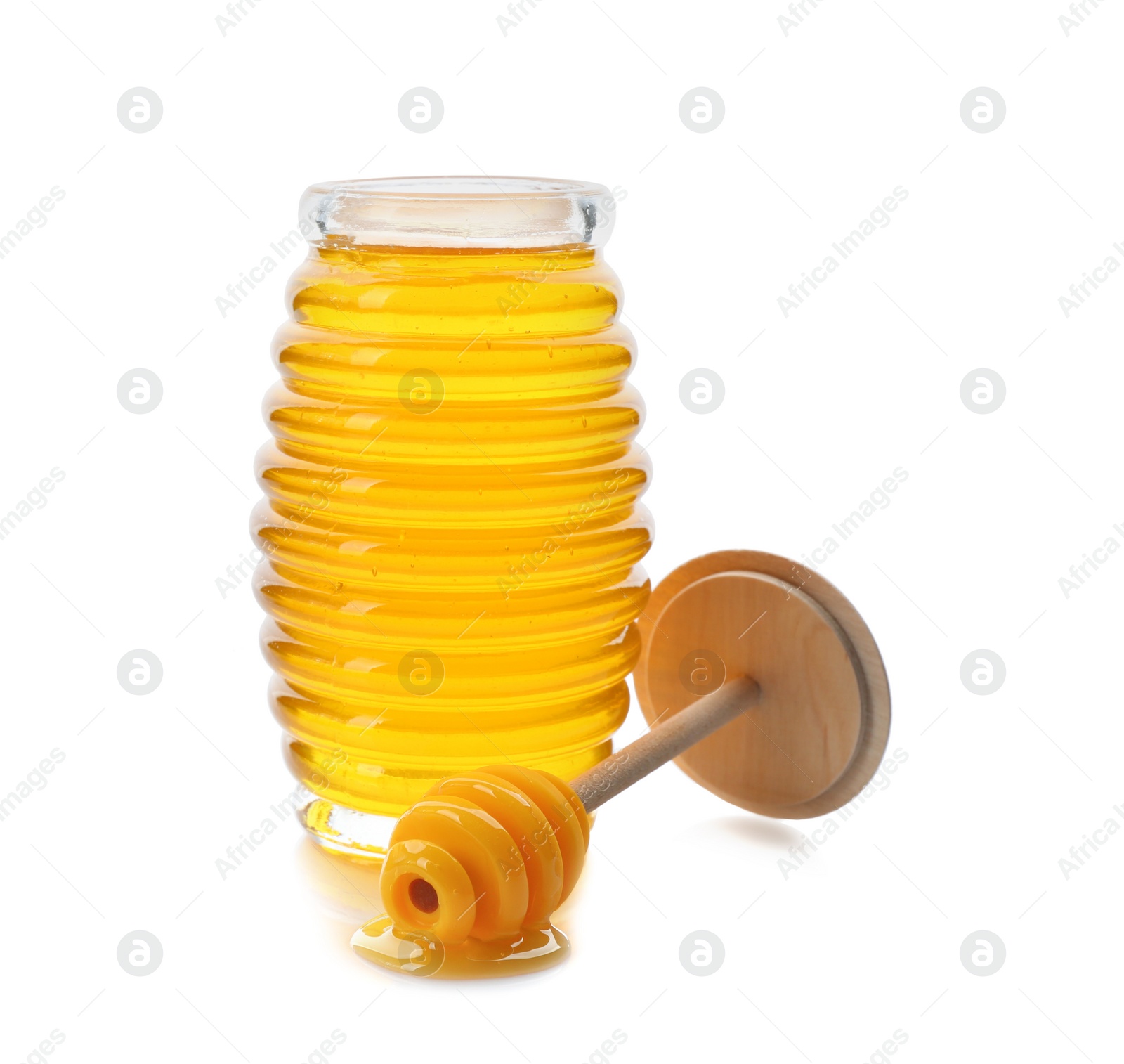 Photo of Fresh honey in jar and dipper on white background