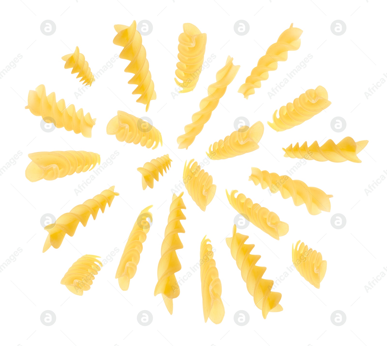 Image of Raw fusilli pasta flying on white background