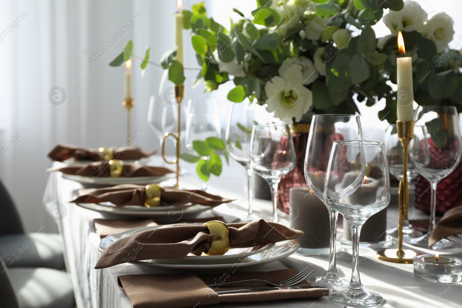 Photo of Festive table setting with beautiful decor indoors