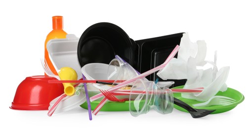 Pile of different plastic items on white background