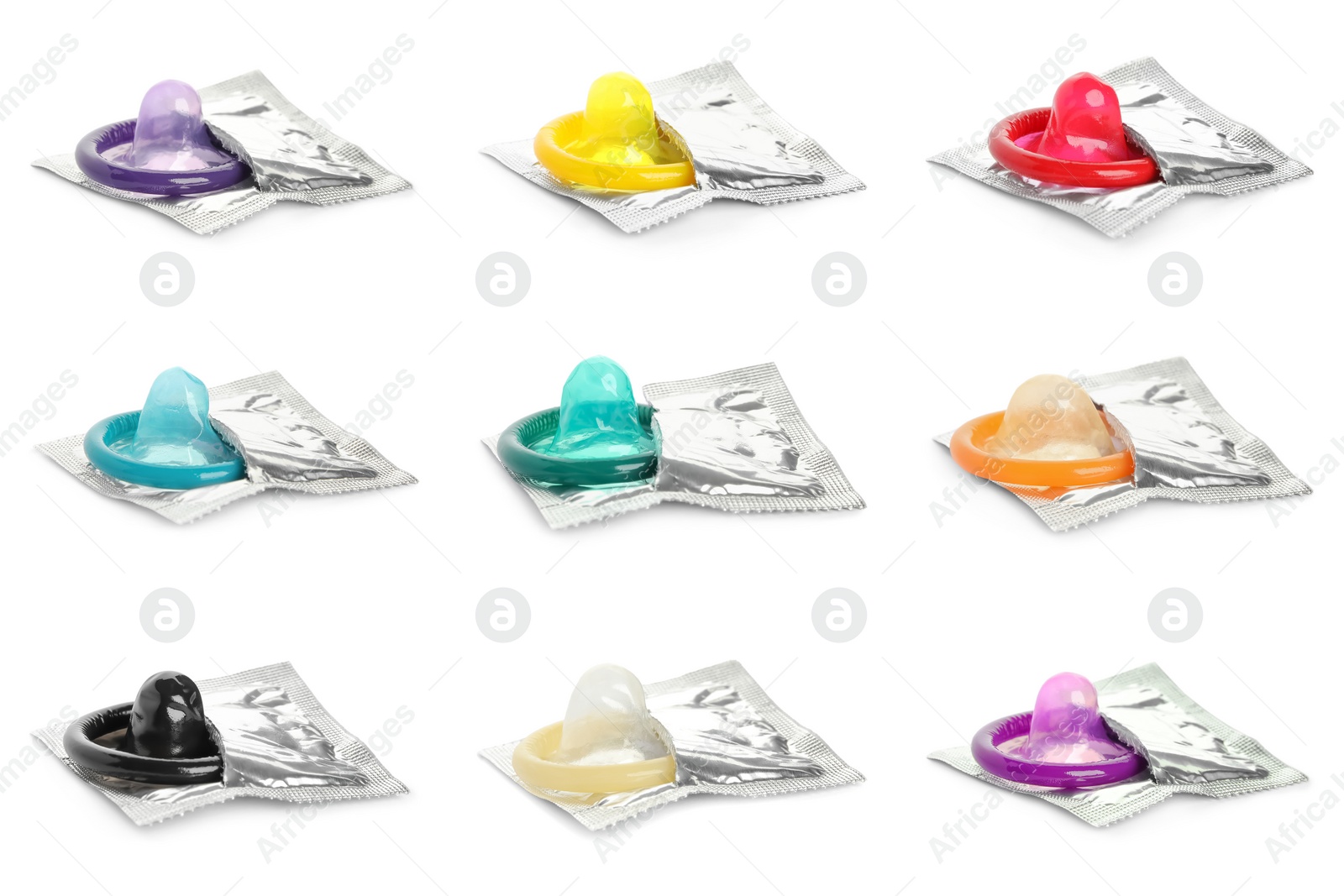 Image of Set with unpacked condoms on white background