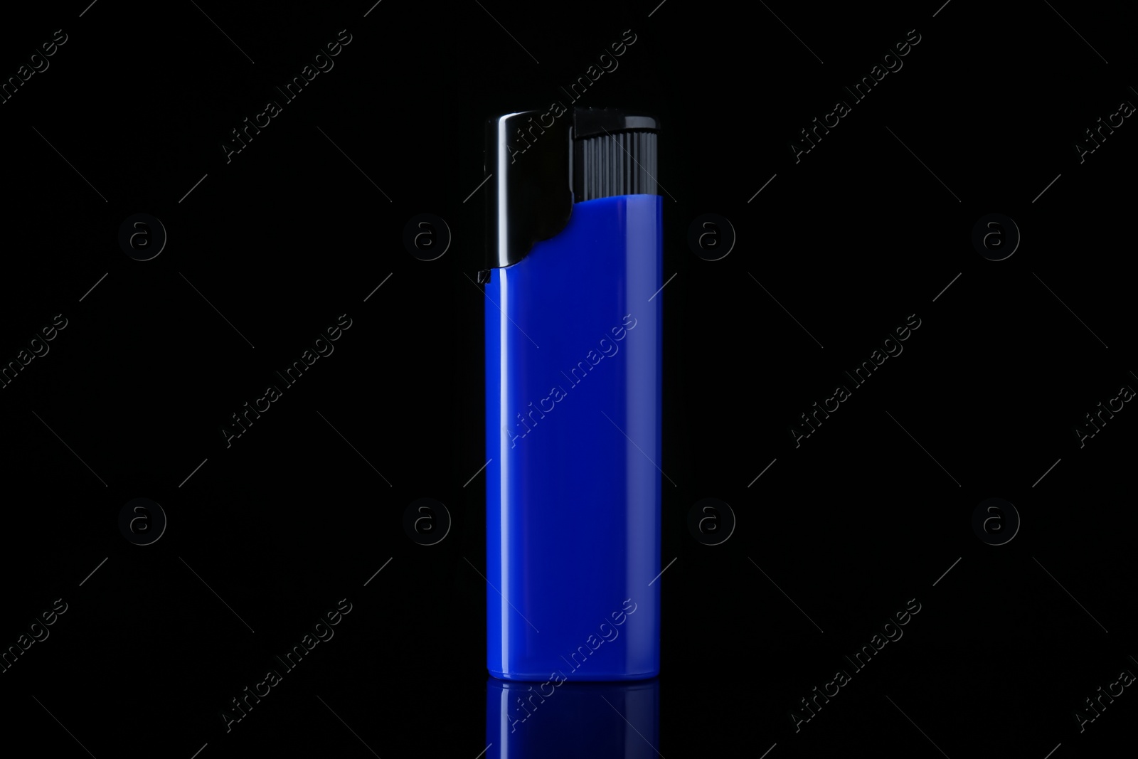 Photo of Blue plastic cigarette lighter on black background, closeup