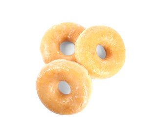 Photo of Delicious donuts on white background, top view