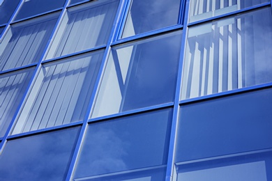 Modern office building with tinted windows. Urban architecture