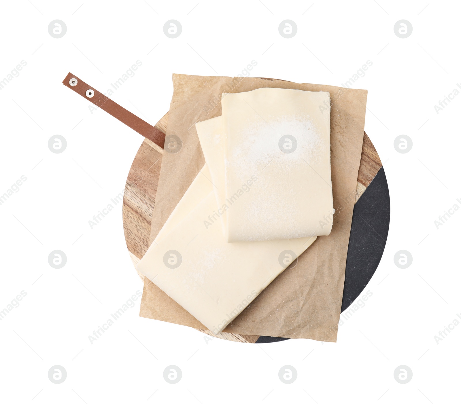 Photo of Raw puff pastry dough isolated on white, top view