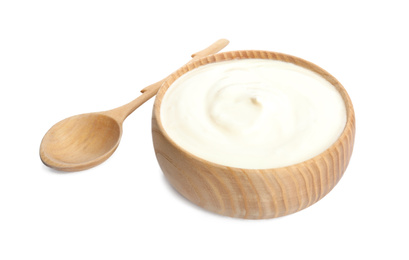 Photo of Tasty organic yogurt in wooden bowl and spoon isolated on white