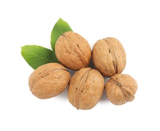 Photo of Whole walnuts in shell and leaves on white background, top view