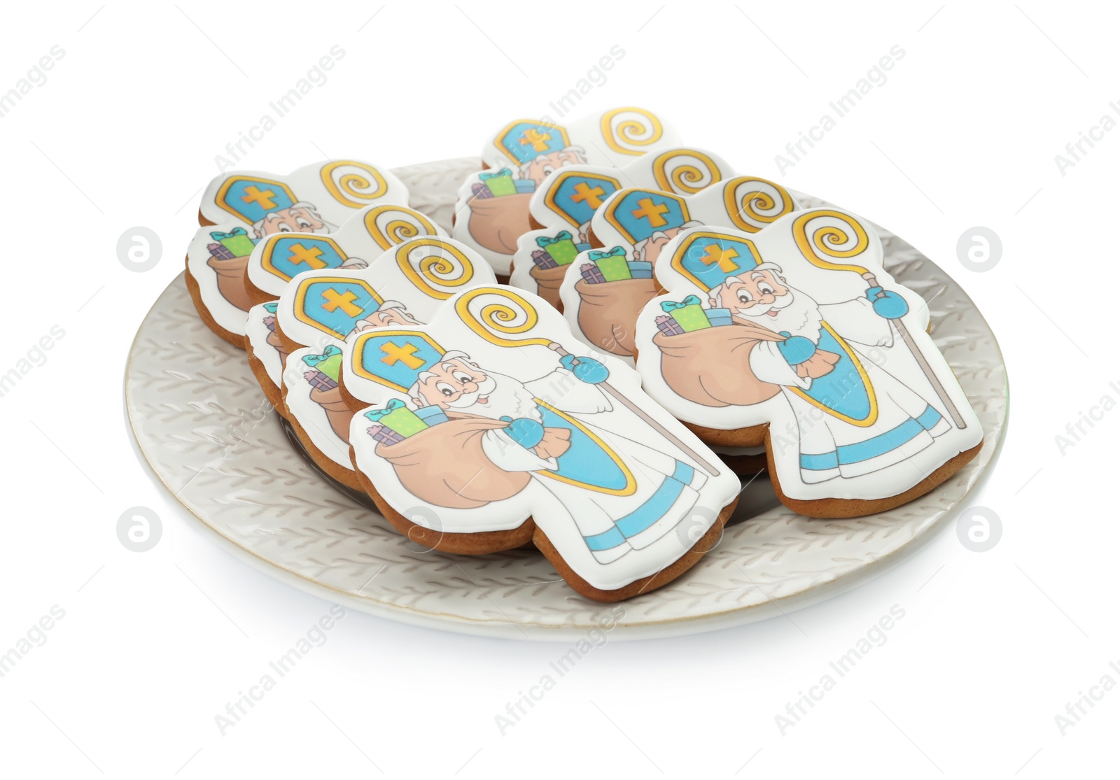 Photo of Tasty gingerbread cookies on white background. St. Nicholas Day celebration