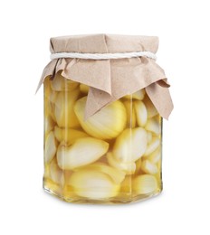 Garlic with honey in glass jar isolated on white