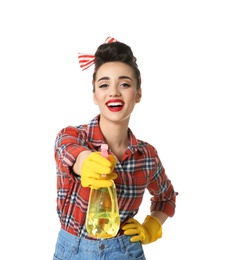 Funny young housewife with detergent on white background