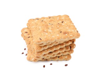 Stack of cereal crackers with flax and sesame seeds isolated on white