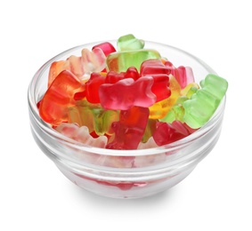 Glass bowl with delicious jelly bears on white background