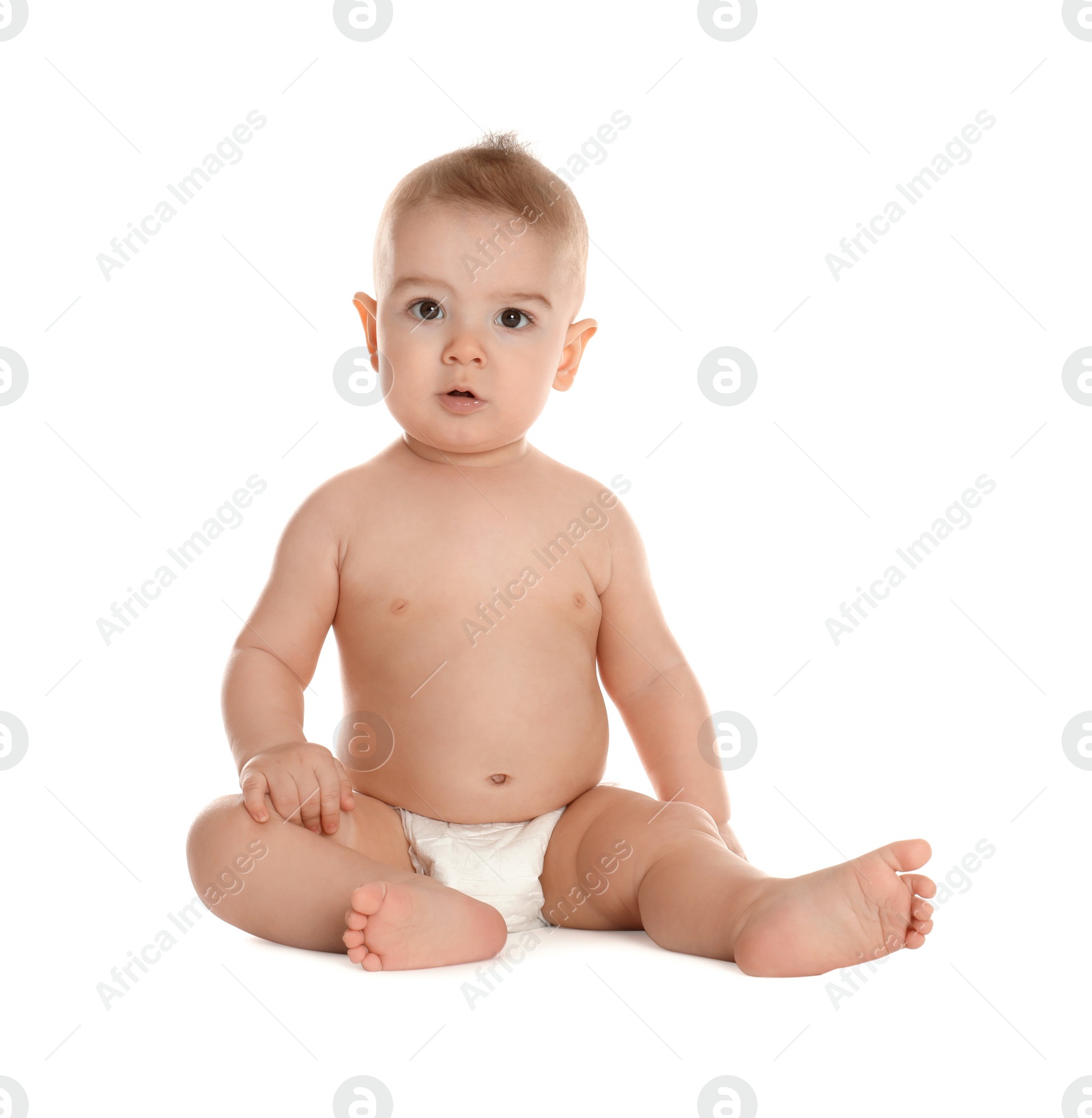 Photo of Cute little baby in diaper on white background