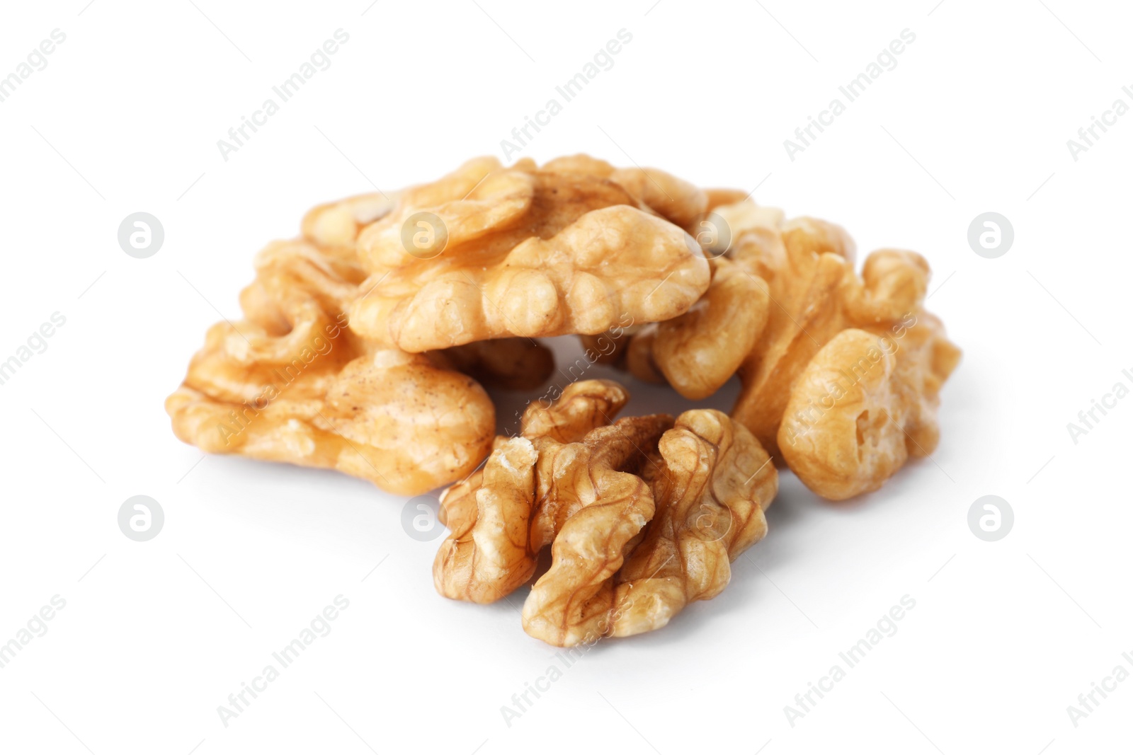 Photo of Heap of tasty walnuts on white background