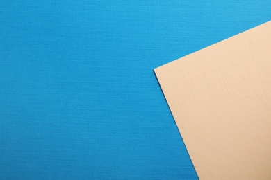 Colorful paper sheets as background, top view