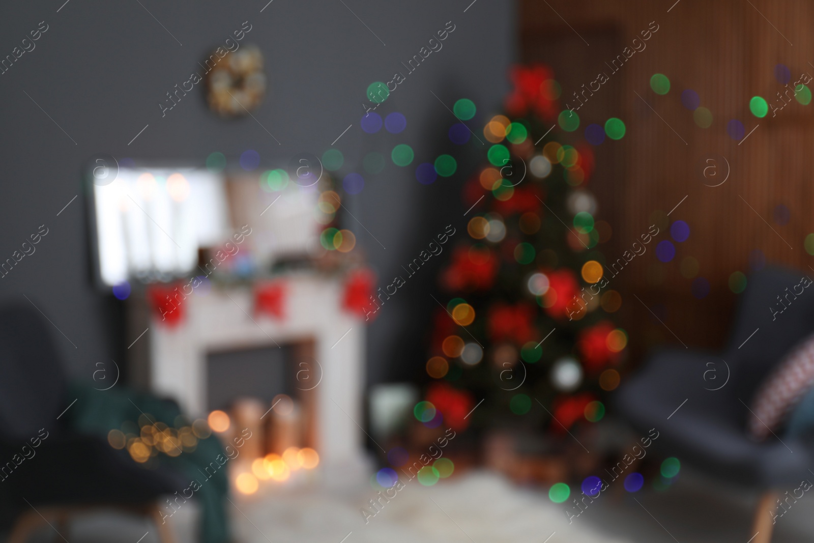 Photo of Blurred view of stylish living room interior with decorated Christmas tree