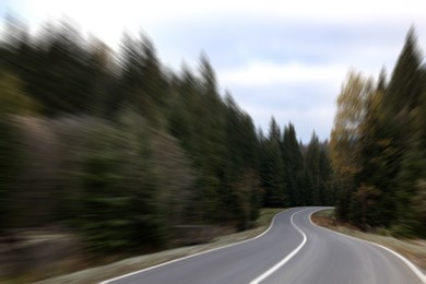 Asphalt country road without transport, motion blur effect