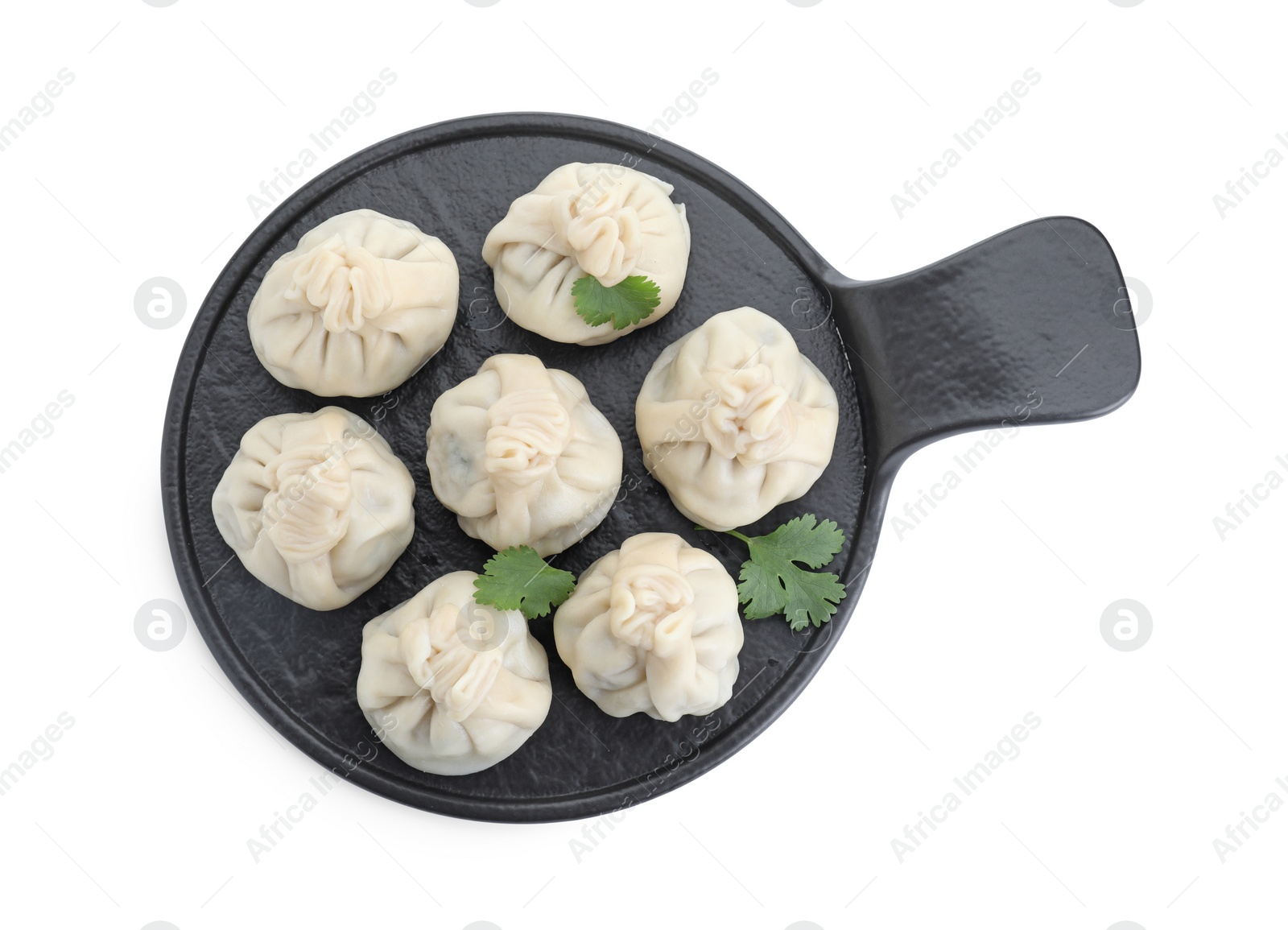 Photo of Serving board with tasty fresh khinkali (dumplings) and parsley isolated on white, top view. Georgian cuisine