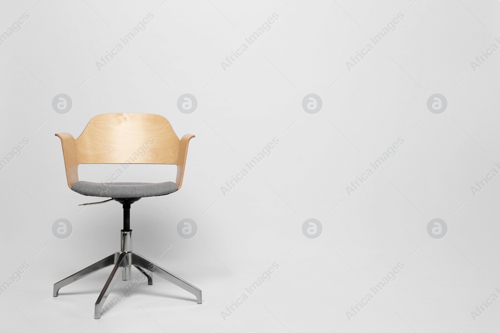 Photo of Comfortable office chair on white background, space for text