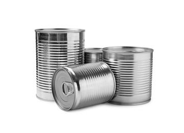 Many closed tin cans isolated on white