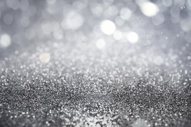 Image of Shiny silver glitter as background. Bokeh effect