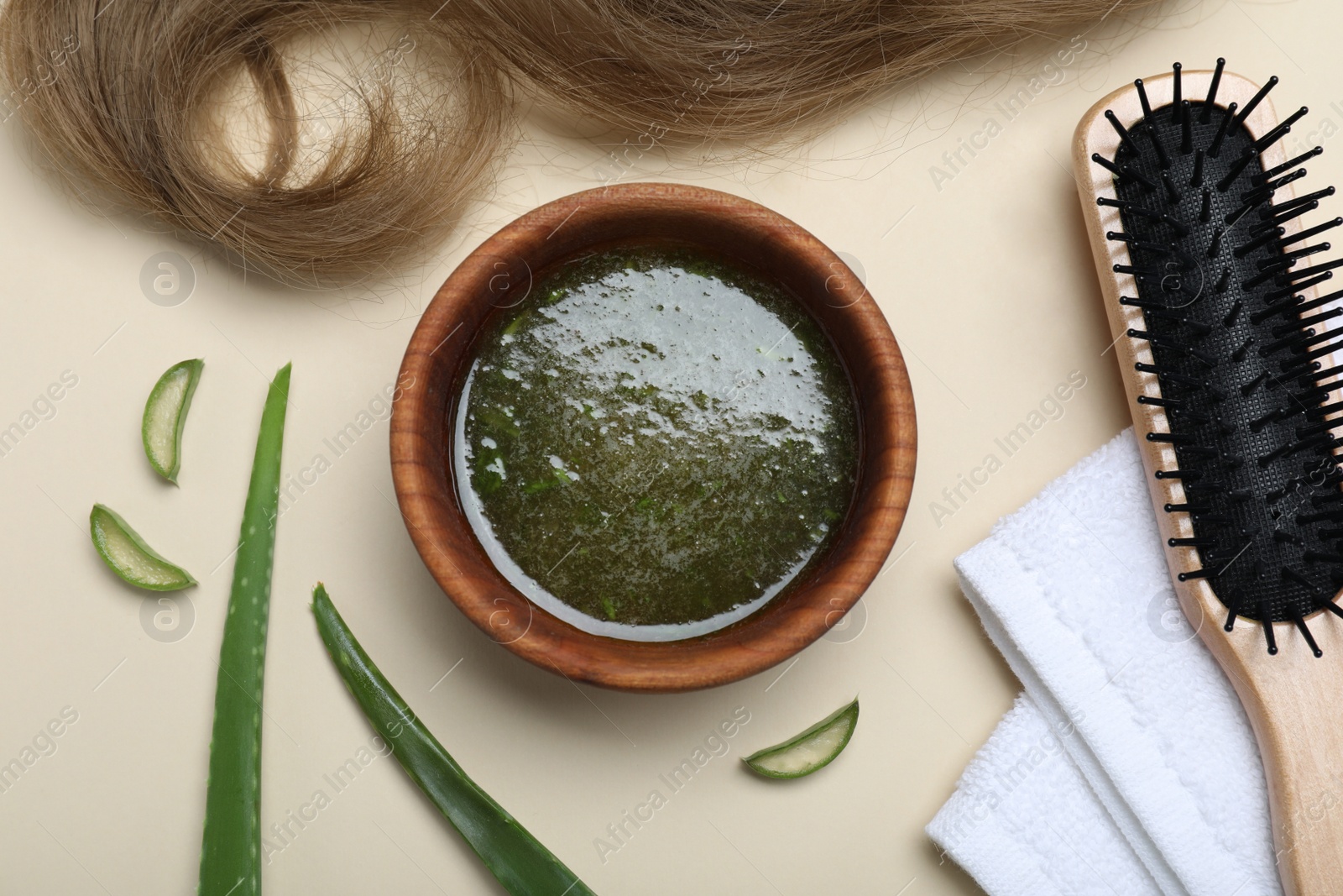 Photo of Flat lay composition with homemade hair mask and ingredients on beige background