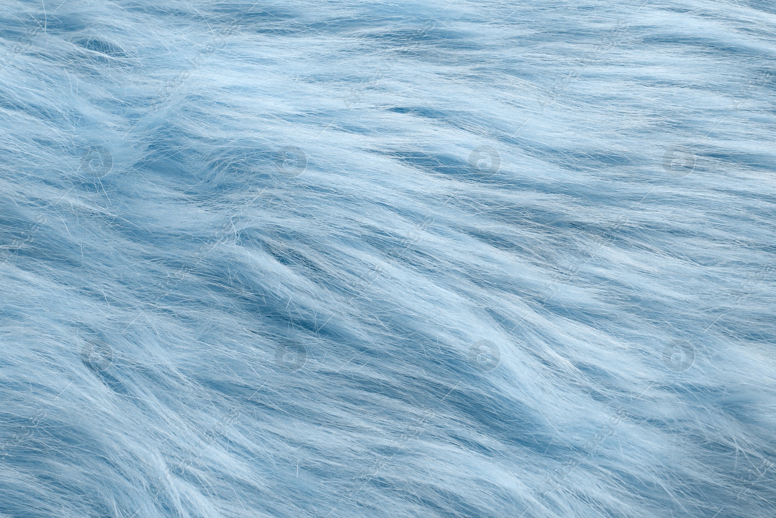 Image of Texture of light blue faux fur as background, closeup