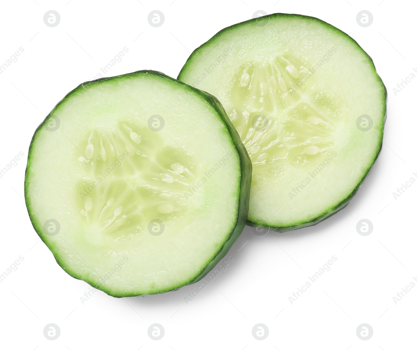 Photo of Slices of fresh cucumber isolated on white, top view