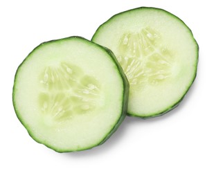 Photo of Slices of fresh cucumber isolated on white, top view