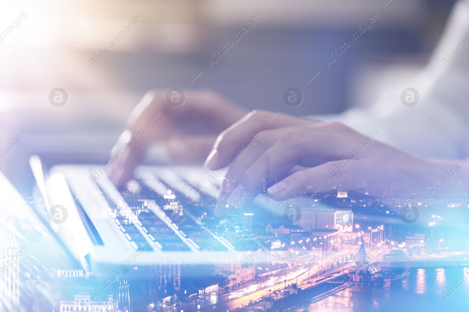 Image of Double exposure of female programmer using laptop and cityscape, closeup 