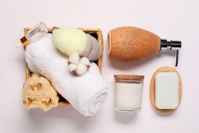 Bath accessories. Different personal care products and cotton flower on white background, flat lay