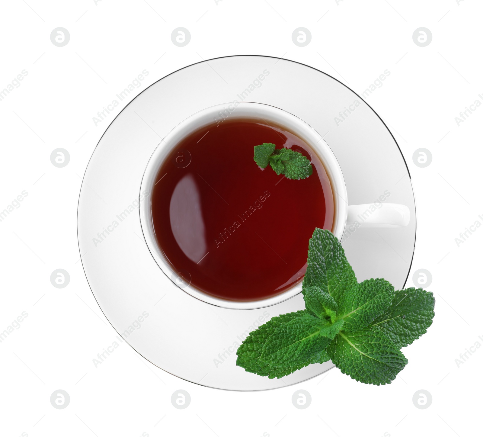 Photo of Cup of aromatic black tea with fresh mint on white background, top view