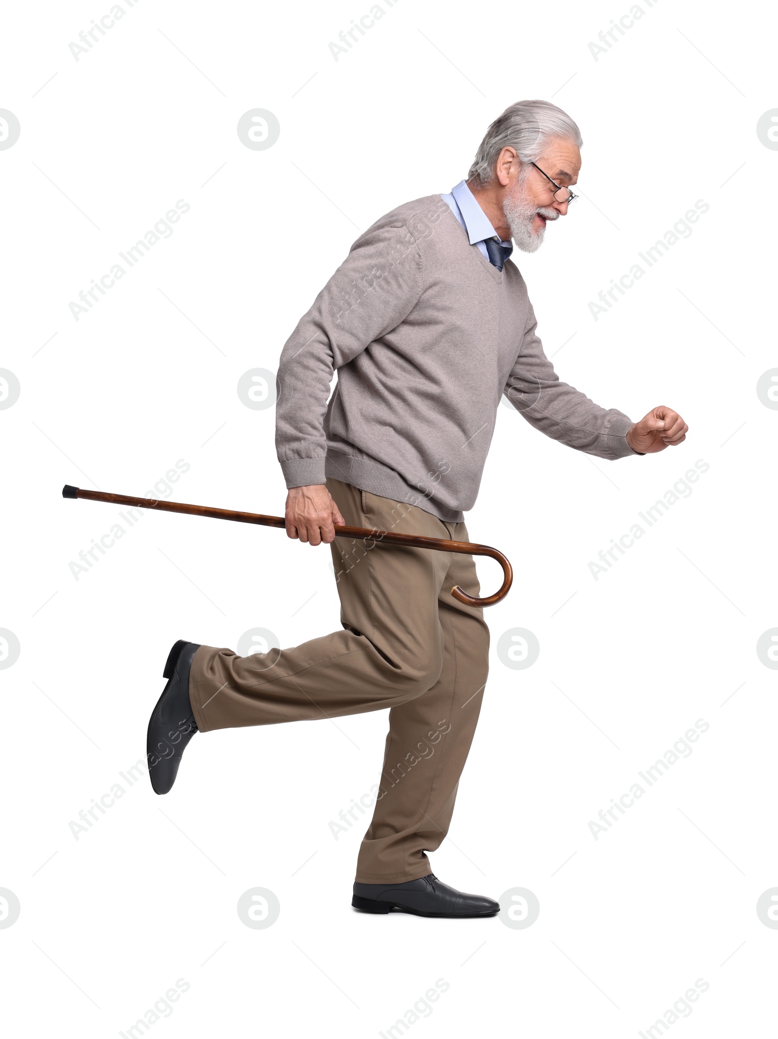 Photo of Senior man with walking cane running on white background