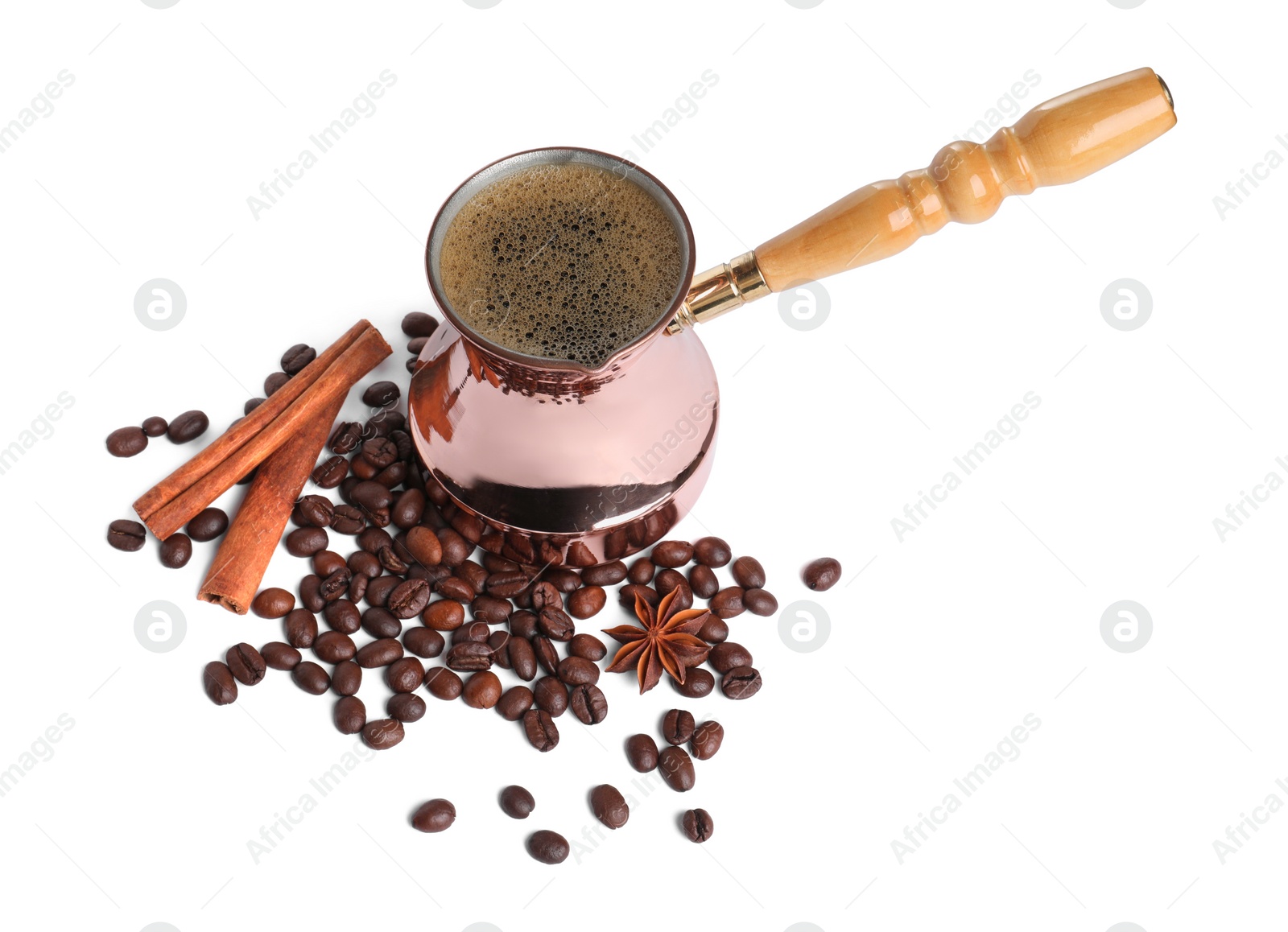 Photo of Turkish coffee. Cezve with hot coffee and spices on white background