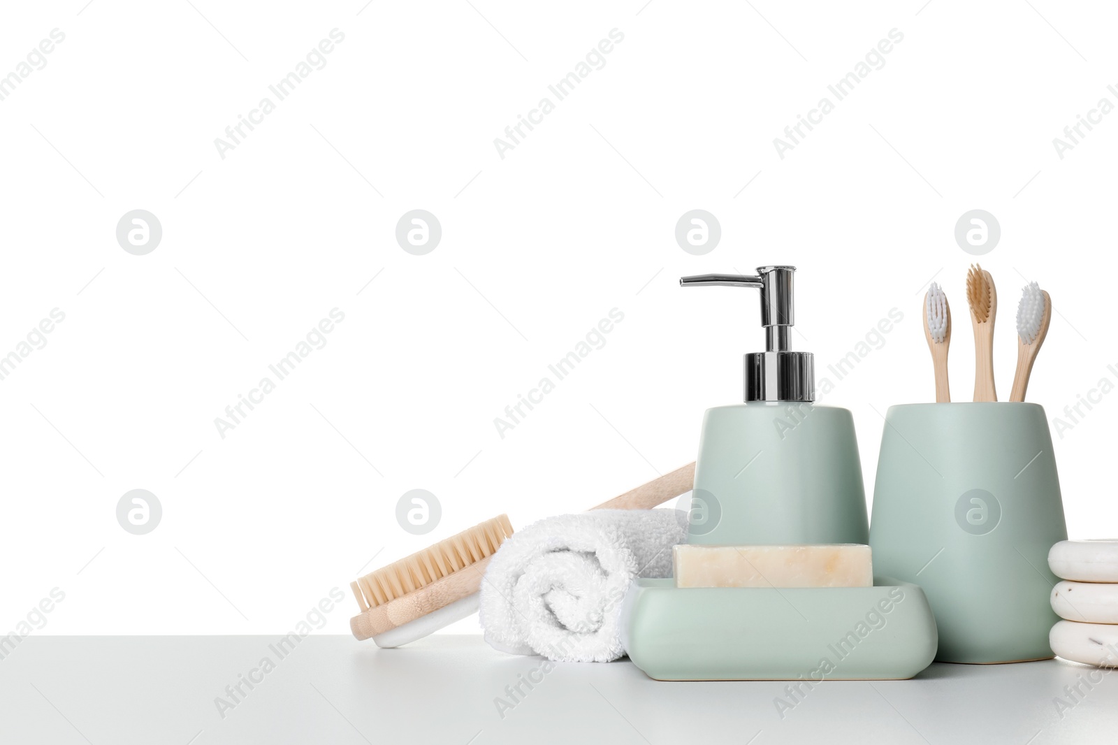 Photo of Bath accessories. Different personal care products on table against white background. Space for text