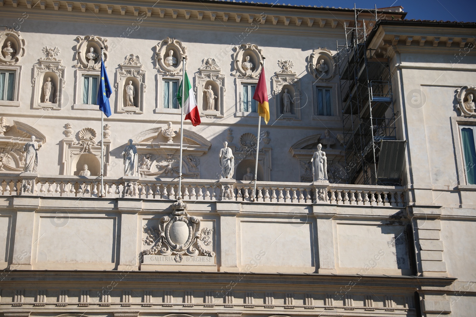 Photo of Rome, Italy - February 3, 2024: Exterior of Villa Borghese with different flags