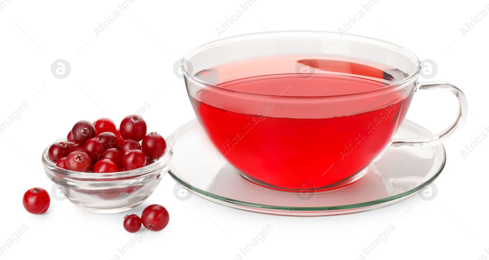 Photo of Cup of delicious cranberry tea and berries isolated on white