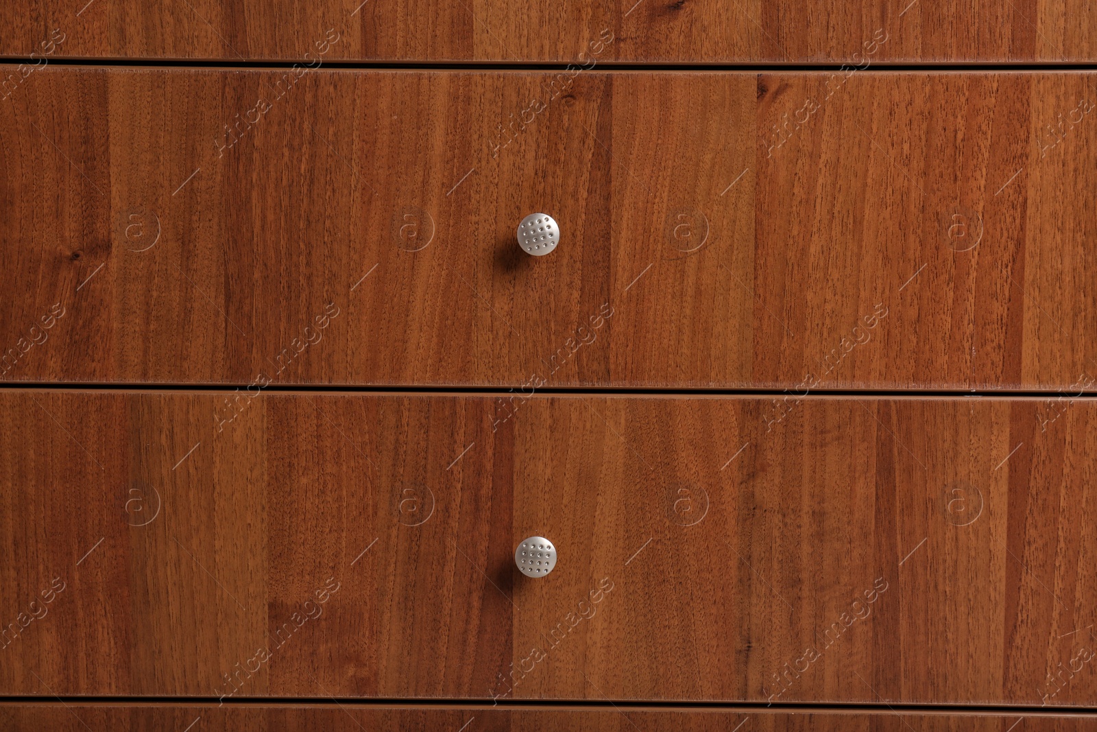 Photo of Wooden wardrobe drawers as background, closeup view