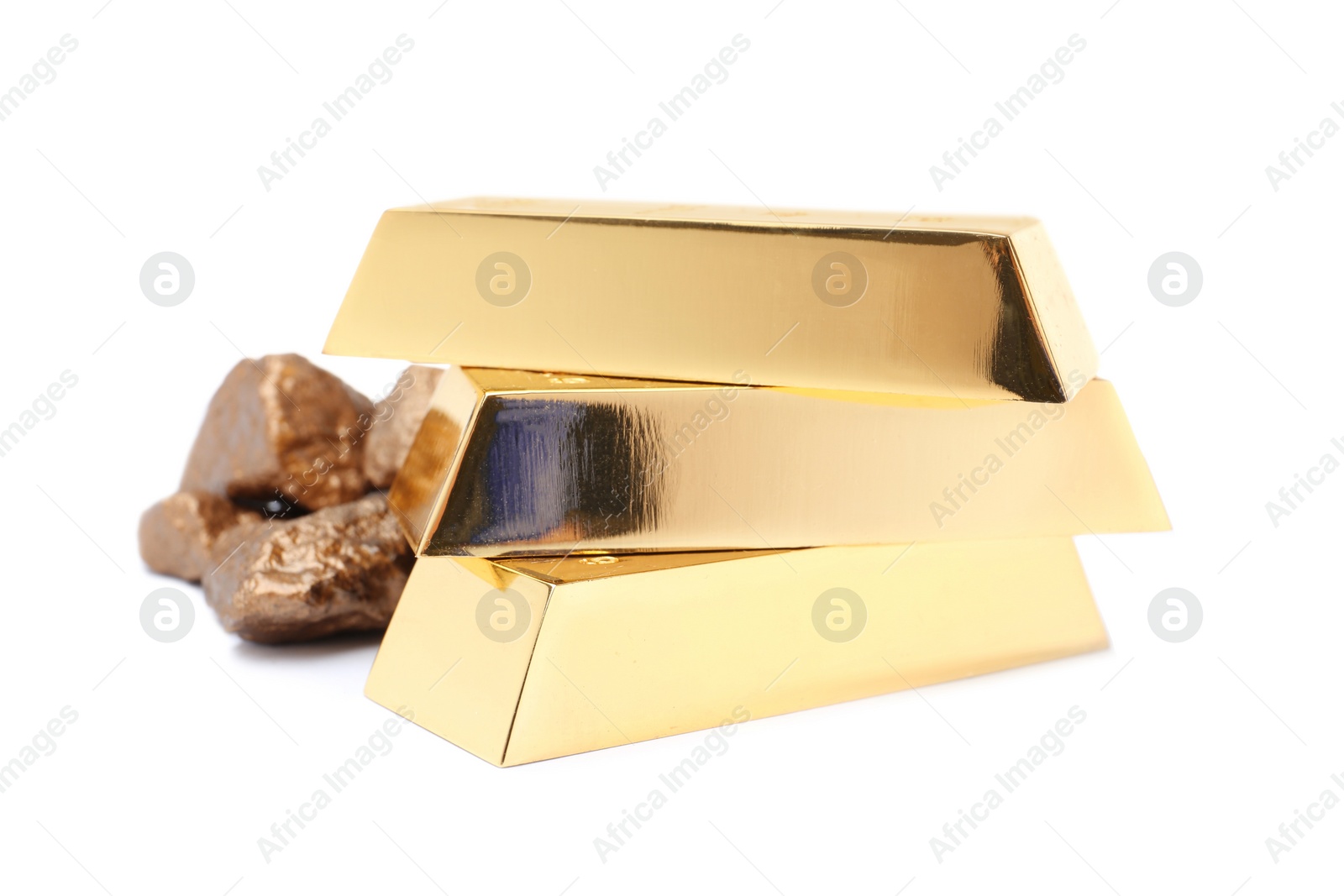 Photo of Gold nuggets and ingots on white background