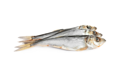 Photo of Tasty dried fish isolated on white. Seafood