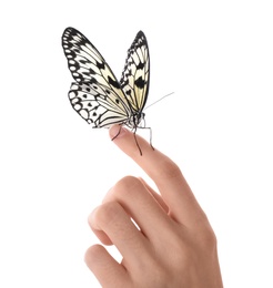 Photo of Woman holding beautiful rice paper butterfly on white background, closeup