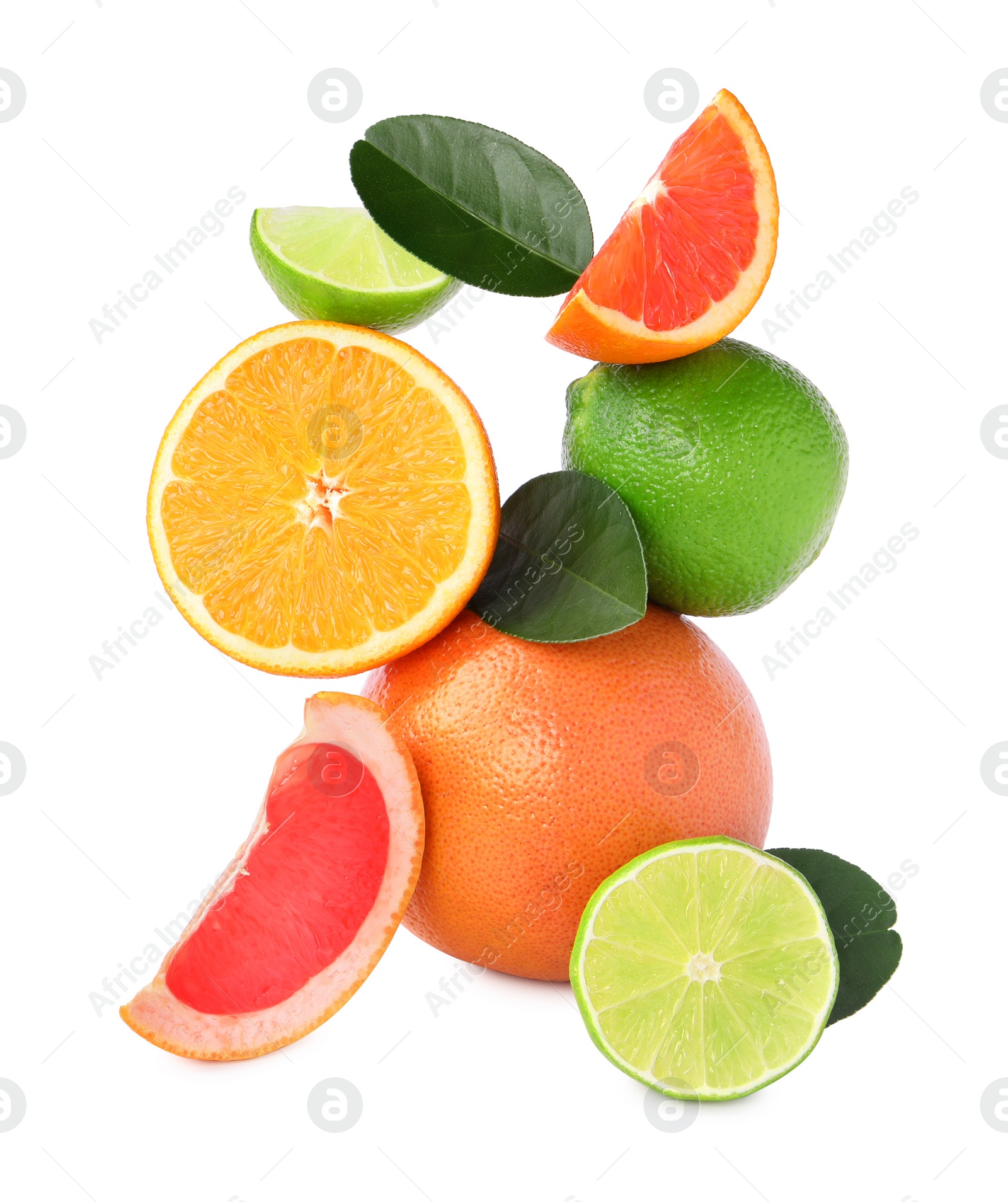 Photo of Fresh ripe citrus fruits and green leaves isolated on white