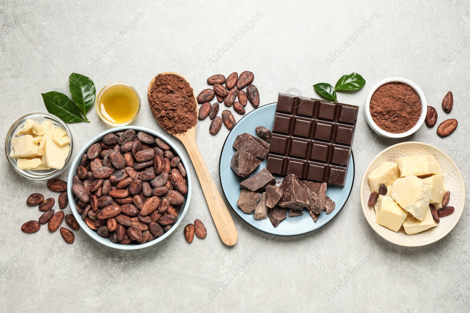 Photo of Flat lay composition with organic cocoa butter on light grey table