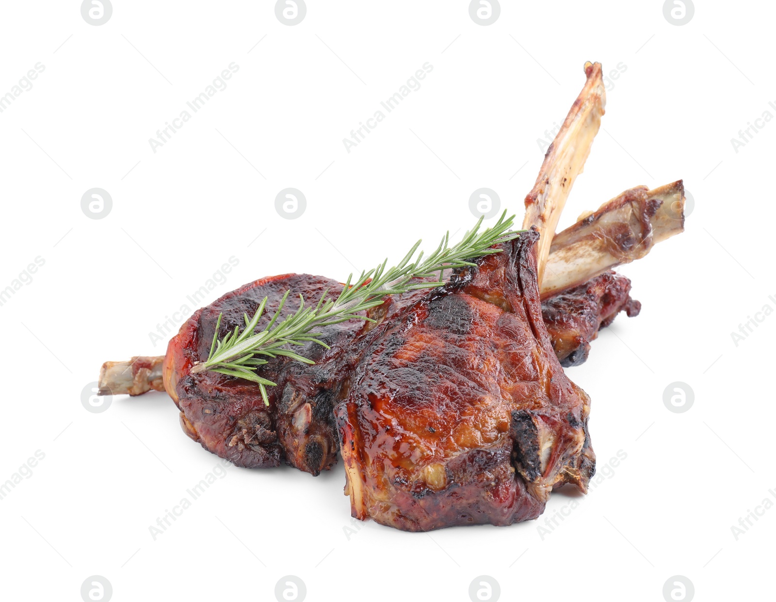 Photo of Pieces of delicious grilled beef meat and rosemary isolated on white
