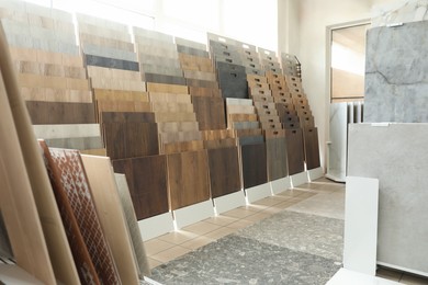 Assortment of tiles in store. Many different samples indoors