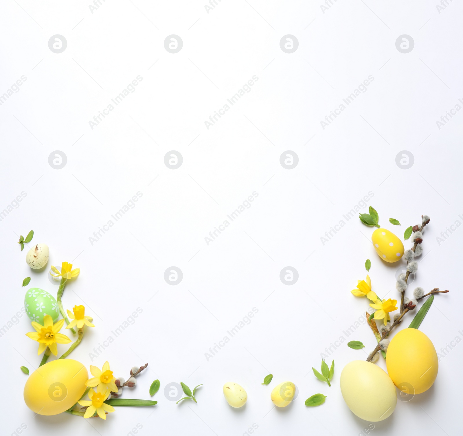 Photo of Flat lay composition with Easter eggs on white background. Space for text