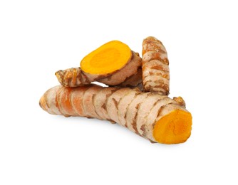 Photo of Fresh cut turmeric roots isolated on white