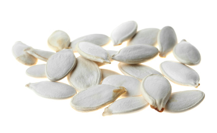 Photo of Pile of raw pumpkin seeds isolated on white. Vegetable planting