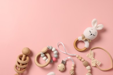 Photo of Different baby accessories on pink background, flat lay. Space for text